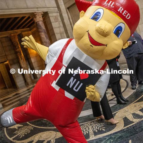 Lil Red poses for a picture in the Nebraska State Capitol Rotunda at I Love NU Day. March 6, 2024. Photo by Kristen Labadie / University Communication.